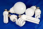 six energy saving fluorescent lamps on blue background